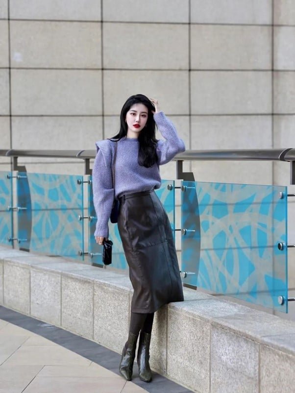 a vest sweater with a long-sleeved sweater