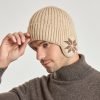 Winterliche, dick gefütterte Plüsch-Strickmütze mit Ohrenklappen und Ohrenschützern