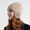 Winterliche, dick gefütterte Plüsch-Strickmütze mit Ohrenklappen und Ohrenschützern