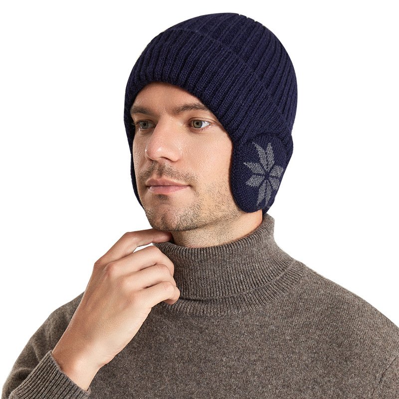 Winterliche, dick gefütterte Plüsch-Strickmütze mit Ohrenklappen und Ohrenschützern